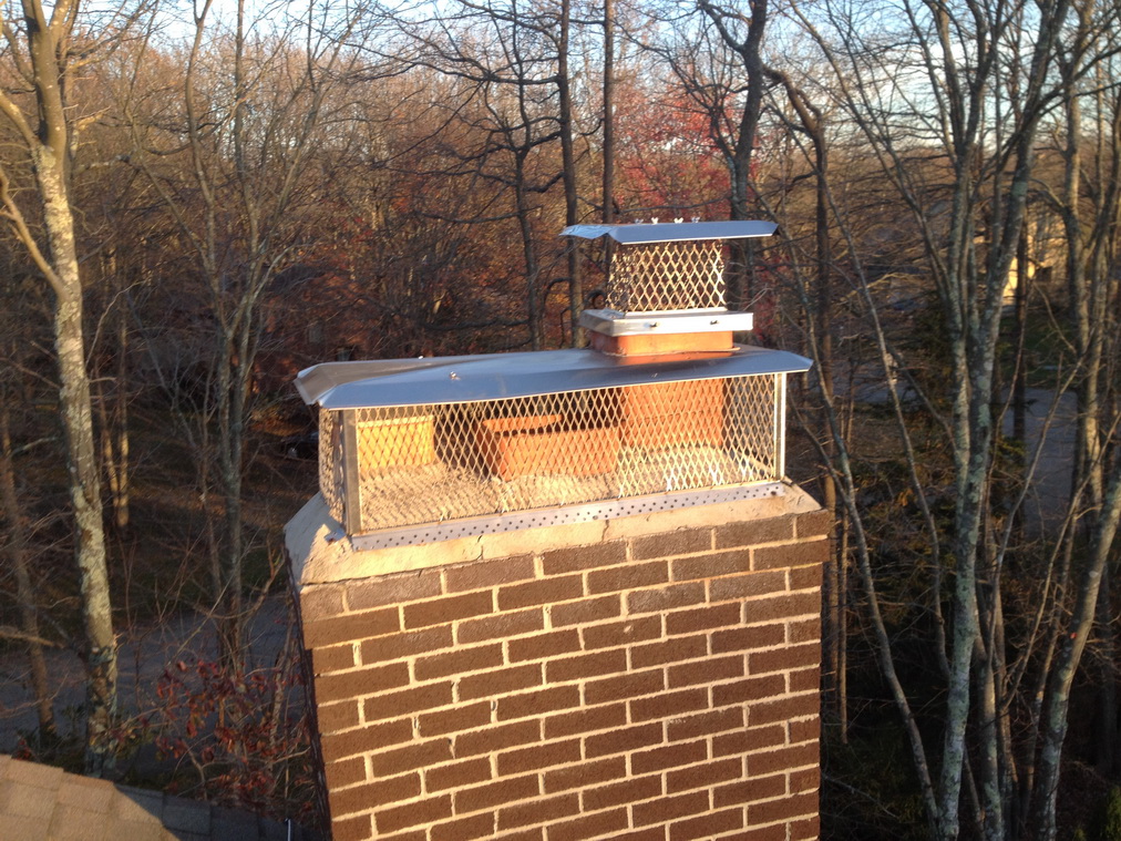 Stainless Steel Chimney Cap Installed on Refinished Chimney